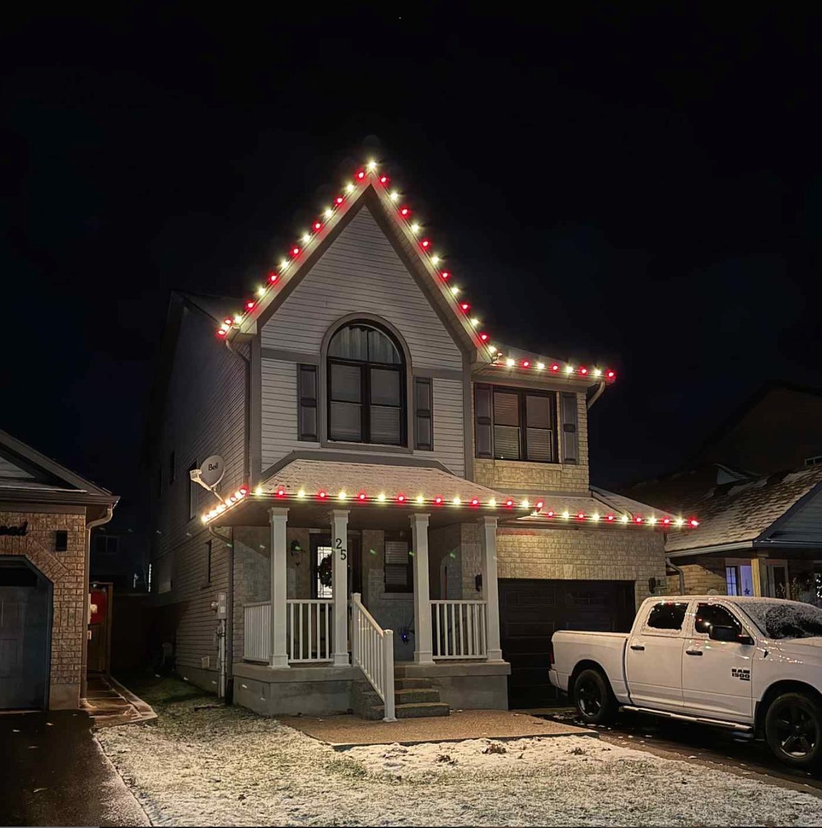Home with warm-white Celebright permanent roofline lighting at dusk
